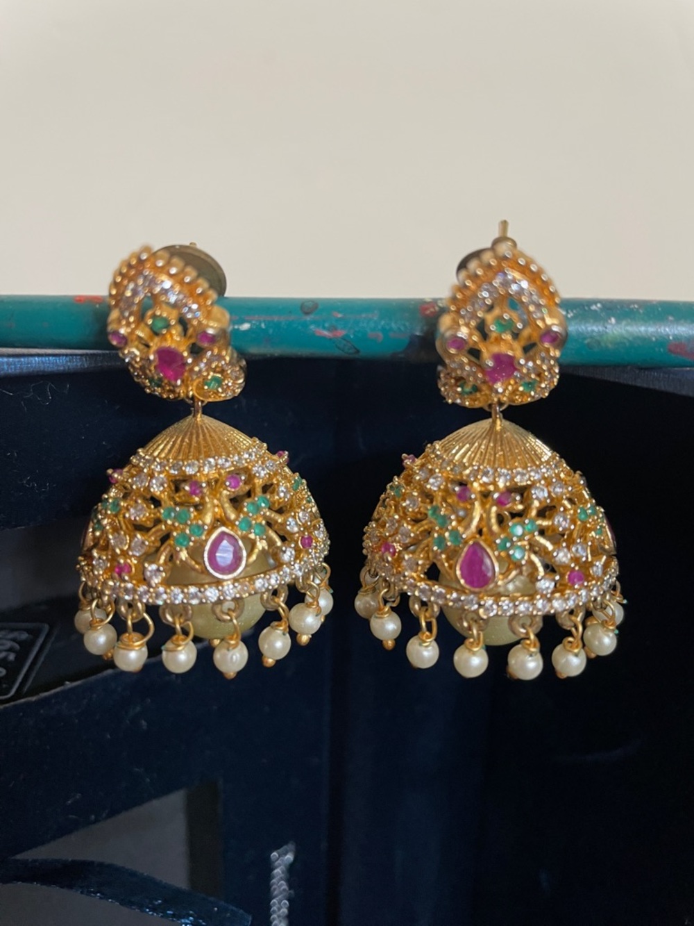 Traditional Gold-Tone Jhumka Earrings with Pink and Green Stones